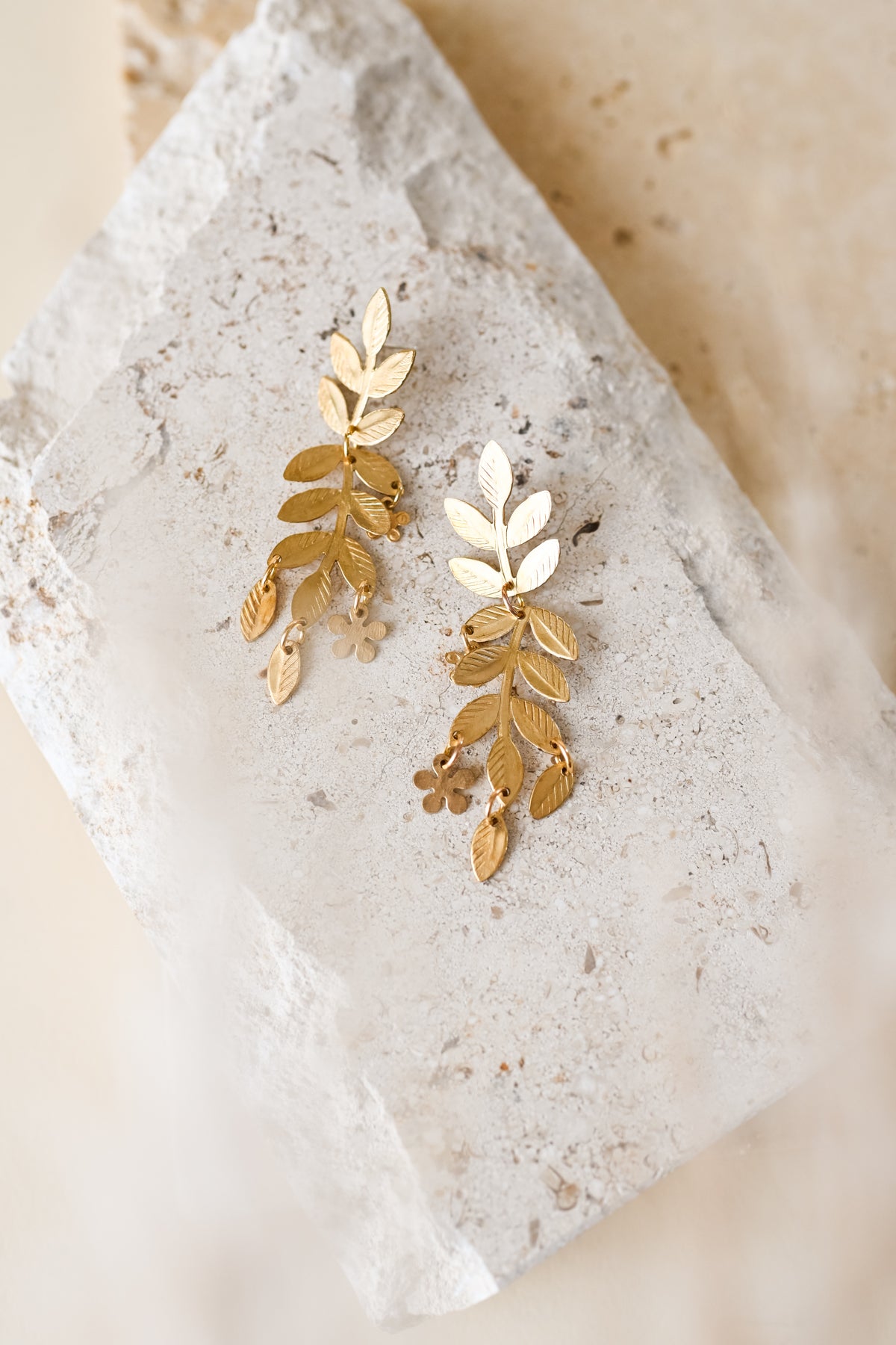 Drop Earring Golden Gold-Plated Green Emerald Stone-Studded Leaf Shaped  Tasselled Earrings at Rs 269/unit in Gurgaon